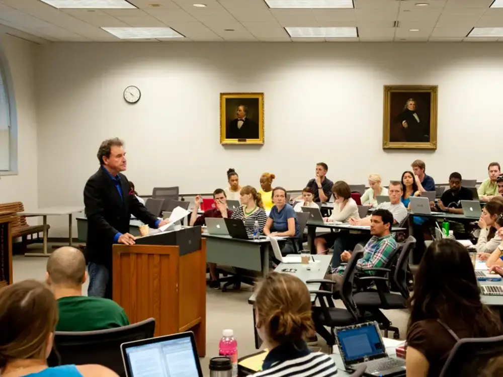 Law professor at lectern at Tulane Law School — Obligation I course
